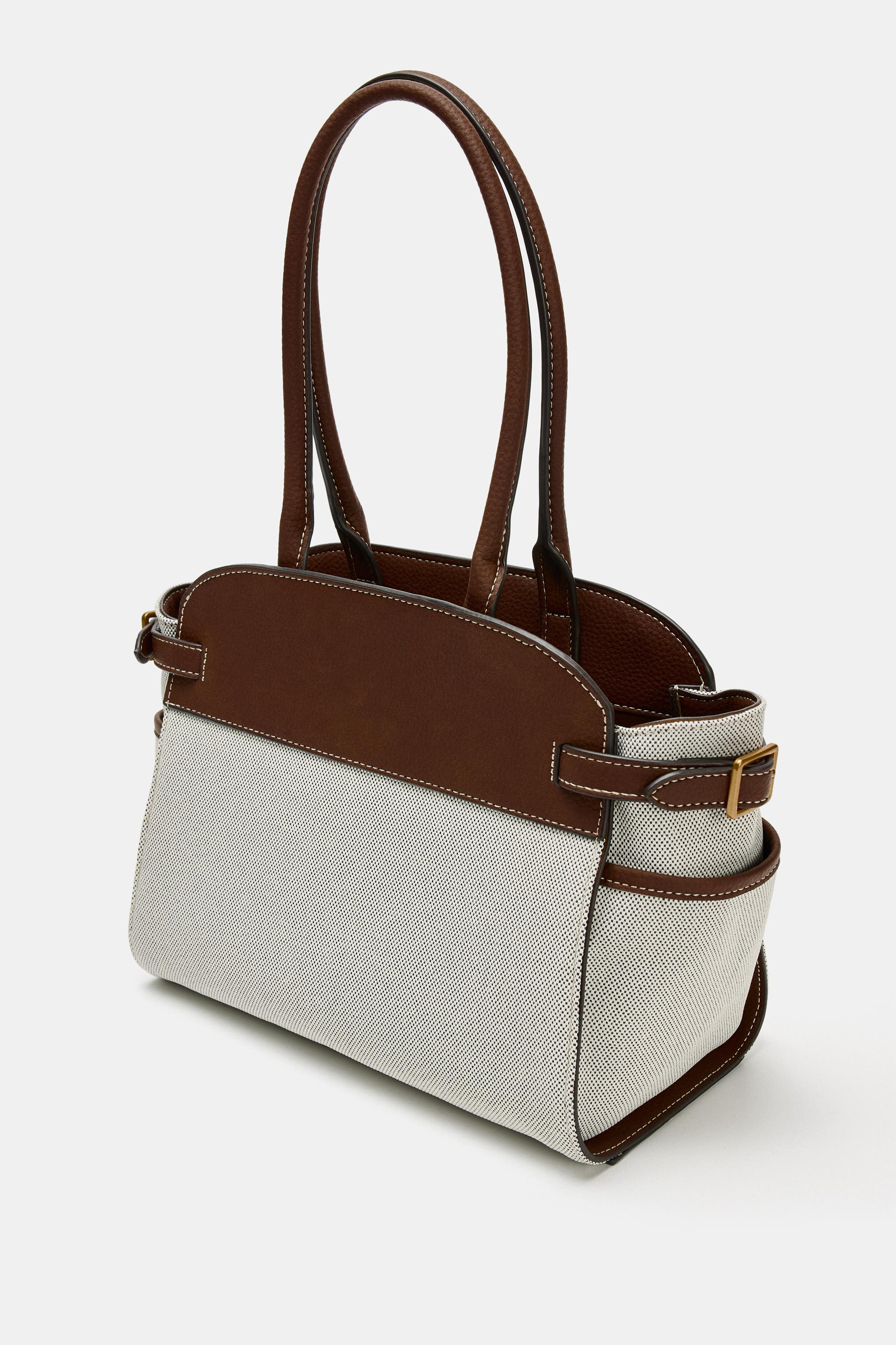 COMBINATION BUCKLE CITY BAG